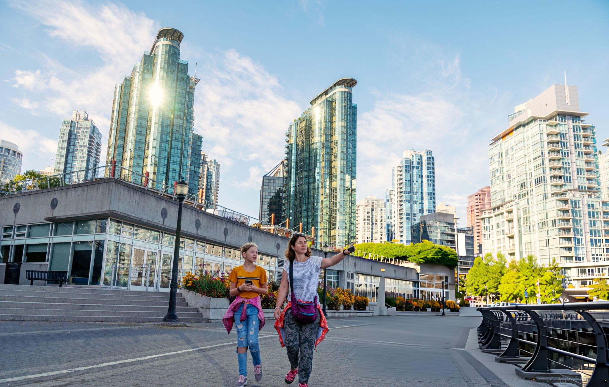 Travelers walking through downtown Vancouver